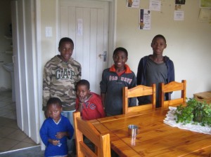 Five young boys in their home on the hill